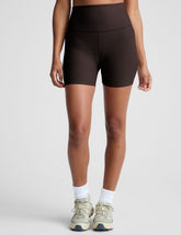 brown high-waisted 5" inseam biker shorts.